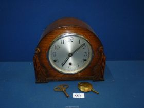 A Mantle clock having Westminster chime, with key and pendulum, made by R.E.