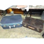 An old blue suitcase and brown leather suitcase belonging to Guy Montague Butler,