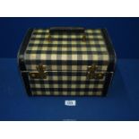 A vintage vanity Case in black and white gingham, 12'' wide x 10 1/2" high x 8'' deep.