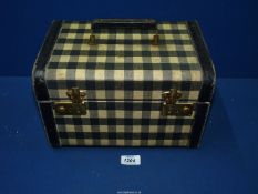A vintage vanity Case in black and white gingham, 12'' wide x 10 1/2" high x 8'' deep.