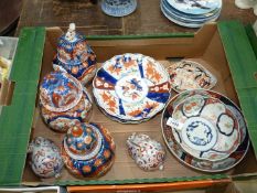 A small quantity of Imari china including three ginger jars, bowls, pair of rabbits etc,