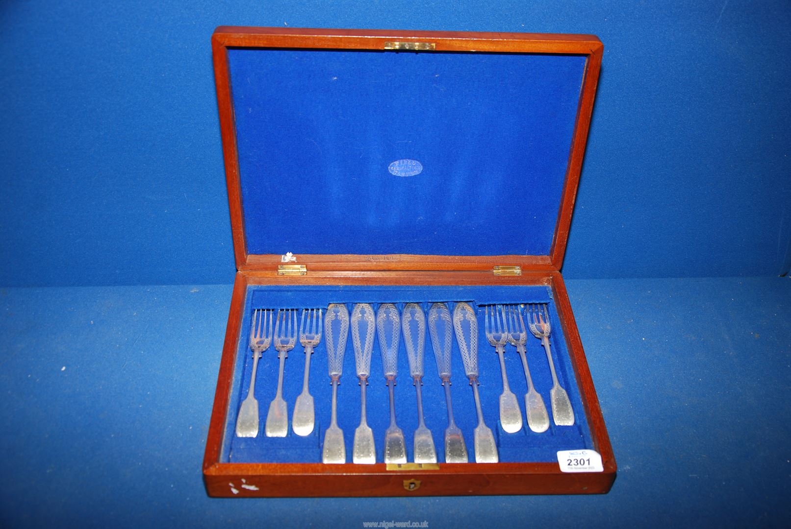 A canteen of fish knives and forks.