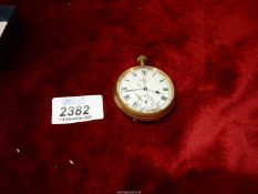 An AWW Co. Waltham USA 'Traveler' brass pocket watch, glass a/f.