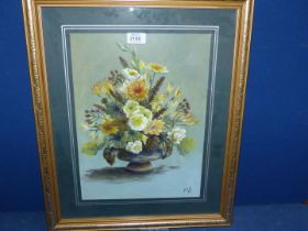 A framed and mounted Watercolour depicting a flower arrangement, initialled lower right G.A.B.