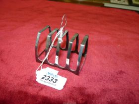 A small silver Toast rack with trefoil shaped handle, Sheffield 1939, makers Northern Goldsmiths Co.