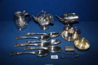 Six plated serving spoons in Kings pattern, plated cruet having blue glass liners,