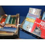 Two boxes of religious themed books including antique bibles, rare religious study guides, etc.