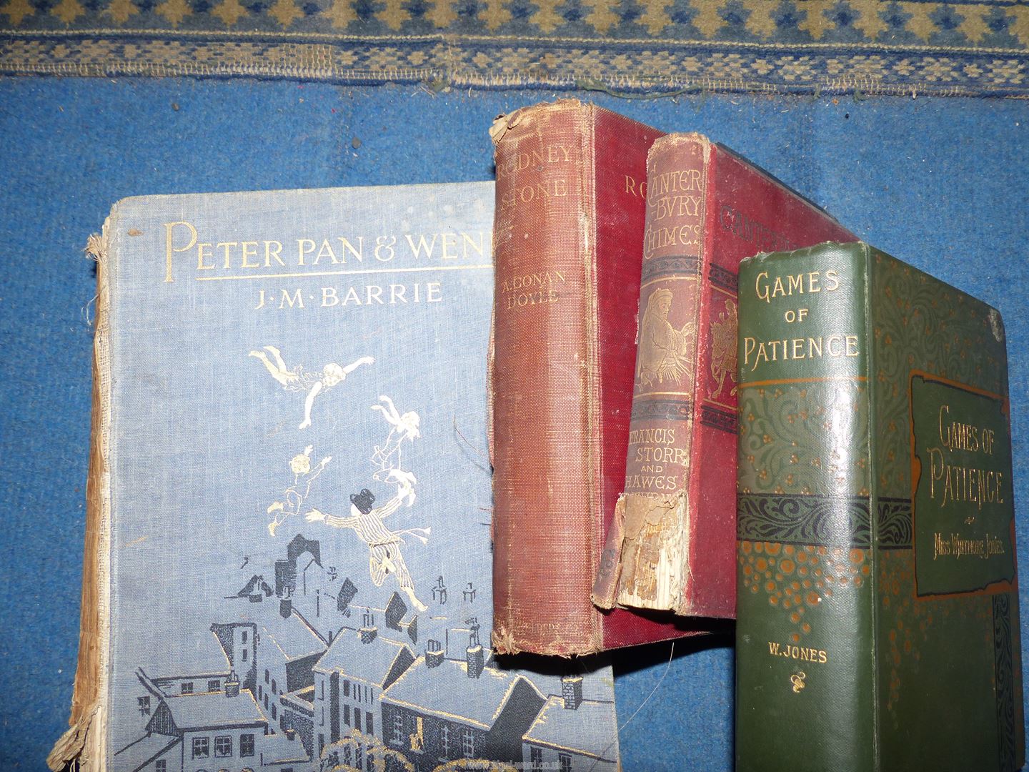 A box of books to include; Peter Pan & Wendy by J.M. Barrie and Violet Needham novels. - Image 2 of 2