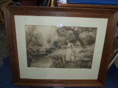 A large wooden framed sepia Print of a Mother and daughter outside a water mill with a young boy