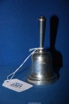 A silver table bell, London 1918, weight 73.93g.