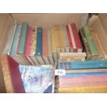 A box of books to include; Peter Pan & Wendy by J.M. Barrie and Violet Needham novels.