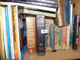 A box of books including James Bond Pan books by Ian Fleming, Mountbatten by Philip Ziegler,