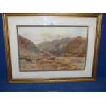 A framed and mounted Watercolour depicting a river valley landscape with Hereford cattle grazing