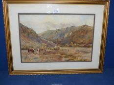 A framed and mounted Watercolour depicting a river valley landscape with Hereford cattle grazing