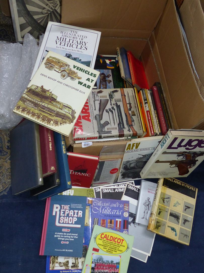A box of books to include; Military Fire Arms, Essential Militaria,