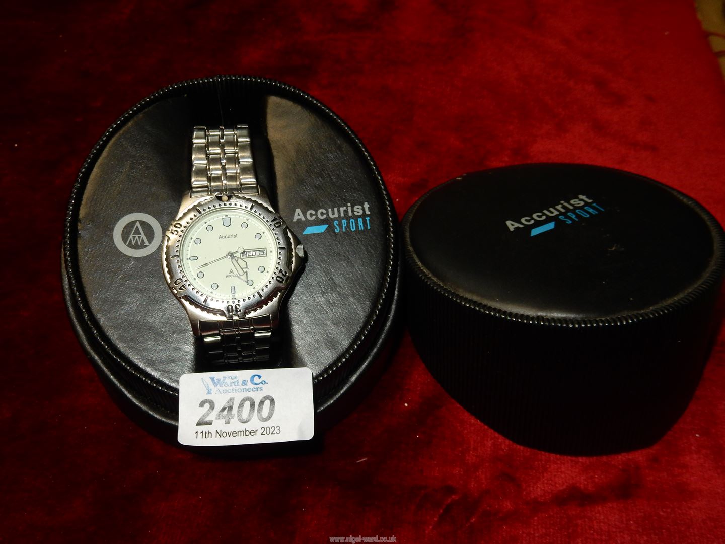A cased Accurist Sport stainless steel gents wristwatch with instructions, guarantee pack etc.