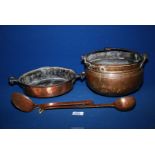 Four copper items; pan with brass handles, cooking pot, ladle and slotted spoon.