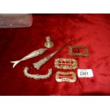 A small quantity of jewellery including buckles, articulated fish,