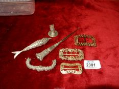 A small quantity of jewellery including buckles, articulated fish,