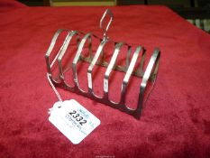 A Silver toast rack, Sheffield 1919,, makers M. Barking & Co., 105 gms.