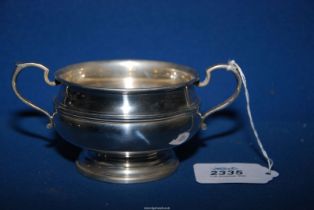 A Silver two handled sugar Bowl, Birmingham 1924, maker C.I, (some small dings), 189.82 grams.