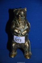 A Brass bear figure, 6'' tall.