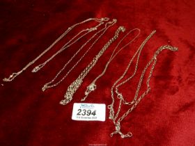 A quantity of silver and white metal chains, some clasps a/f., overall weight 23.55g.