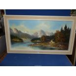 A framed oil painting depicting The Berge Mountains with river valley and cabin,