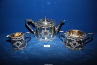 A silver plated Teaset, heavily embossed, including teapot, sucrier and milk jug.