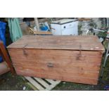 A large pine lidded box, 59'' wide x 24'' deep x 25'' high.