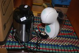 A coffee machine and juicer.