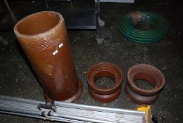 Three glazed pipes, 13 1/2'' depth x 34'' high plus two joiners 14'' diameter x 9'' high.