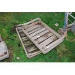 Two wooden vegetable crates.