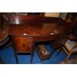 A Mahogany bow front sideboard with central kneehole flanked by cupboards 4' wide x 24½" depth x