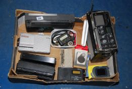 A box of old radios, satellite finder etc.
