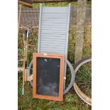 A plastic ramp, galvanised plain wire and a notice board.