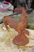 A cast iron Cockerel.