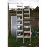 Two eight rung multi purpose aluminium ladders.