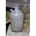 A galvanised screw top churn, 22'' high.