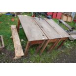 A small wooden bench and three school desks, 40'' wide x 17'' x 28'' high.