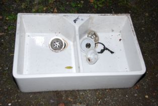 A double sink, 31 1/2'' wide x 19 1/2'' x 8 1/2'' deep.