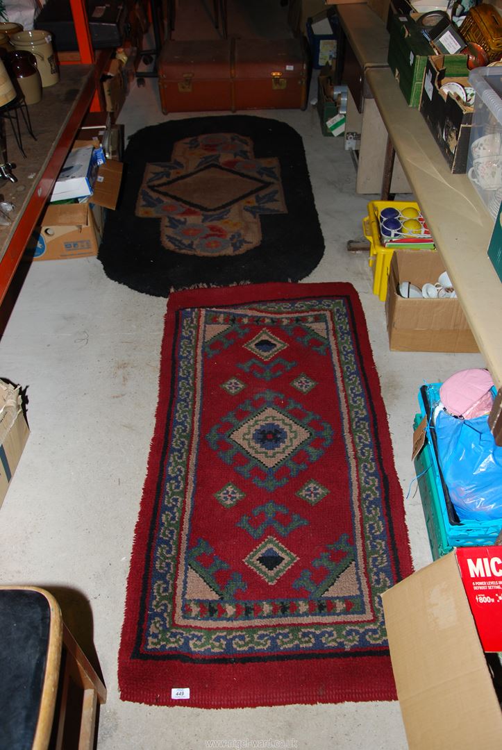 Two rugs hand knot - 67" x 3' and 59" x 28", and a trunk.