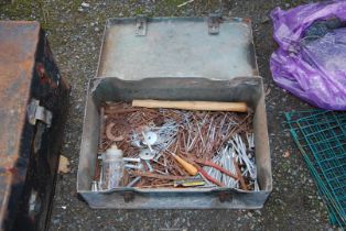 A military toolbox and contents.