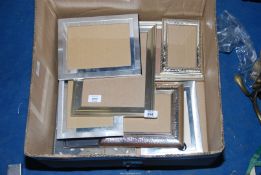A box of pictures frames various sizes.