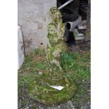 A moss covered figure of a lady, 31'' high.
