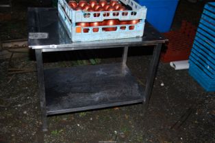 A stainless steel two tier table, 36'' x 28'' x 28'' high.