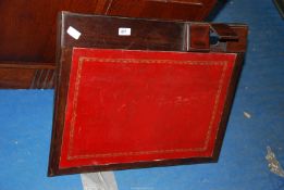 A leather top writing slope with three inkwells, 25 1/2'' wide x 20 1/2'' deep.