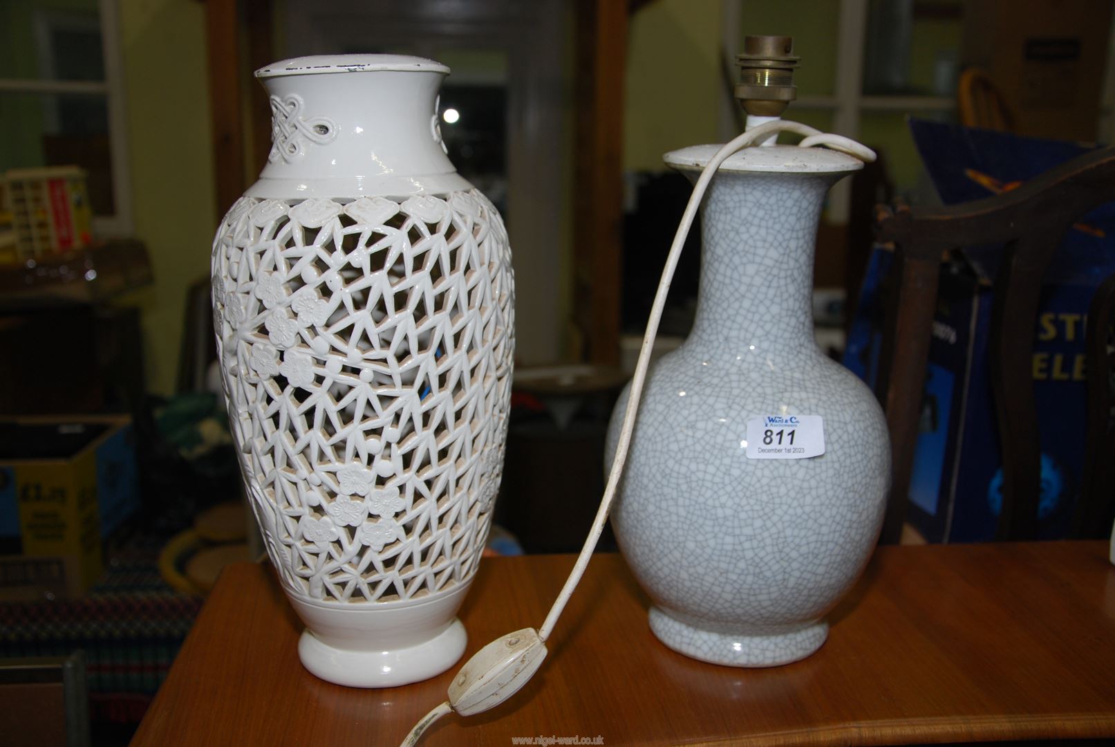 Two porcelain table lamps bases, one having pierced decoration..