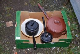 A Green & Co mixing bowl and saucepans.