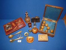 A quantity of treen to include Standish, box of miniature bowls, carved seed head, etc.